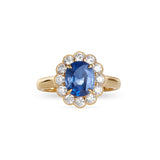 Marguerite Ring in 18 carat gold with 1.4 carat Blue Sapphire